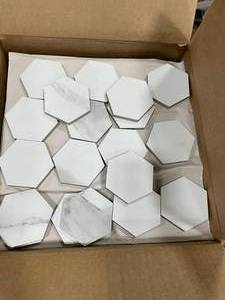 lot 68 image: 1,440 Pieces - 2 Hexagon White Marble Porcelain Tiles