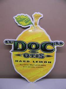 lot 14 image: DOC OTIS HARD LEMON TIN BAR SIGN - APPROX 23 BY 20 - SEE PICTURES