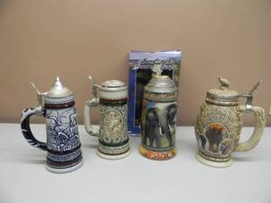 lot 47 image: Vintage Avon Wildlife Beer Steins - AFRICA, AMERICAN, TROUT, ENGLISH SETTER, ROCKY MOUNTAIN GOAT, CONDOR, GOLDEN EAGLE, BIGHORN SHEEP, ALASKAN MOOSE, FALCON  - NICE - SEE PICTURES