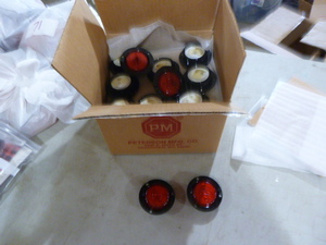 lot 77 image: Case of PM Red LED Marker Lights