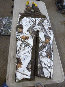 lot 128 image: Mossy Oak Yukon Gear Reversible Hunting Bibs