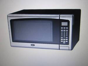 Oster 1.1 Cu. Ft. 1000-Watt Counter...