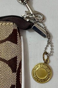 lot 193 image: Coach Wristlet