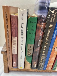 lot 303 image: Vintage Book Holder with a Variety of Books
