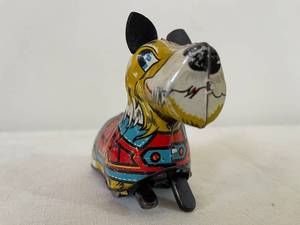 lot 296 image: Wee Scottie Wind Up Toy