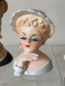 lot 12 image: Four Vintage Head Vases