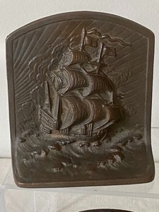 lot 28 image: Pair of Cast Iron Sailboat Motif Bookends