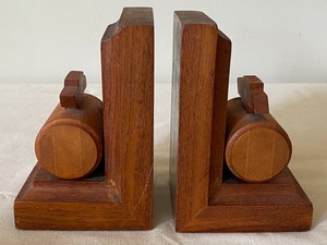 lot 27 image: Folk Art Wooden Bookends and Vintage Wooden Souvenir Faux Clock Bank from Nisswa, MN