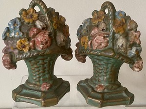 lot 41 image: Three Floral Cast Iron Door Stops
