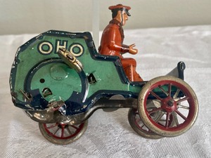 lot 252 image: Vintage Celluloid and Metal Toys