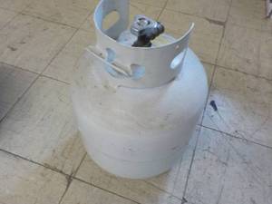 lot 89 image: Cylinder partially full...