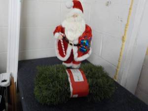 lot 145 image: 21 Tall Santa and 50 ft Garland...