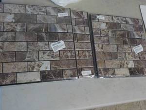 lot 242 image: 3 pkgs 4 Each 12 x 12 squares Marb...