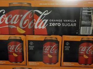 lot 276 image: 4 - 12 packs Coca Cola Orange Vanil...