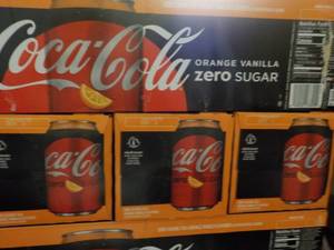lot 278 image: 4 - 12 packs Coca Cola Orange Vanil...