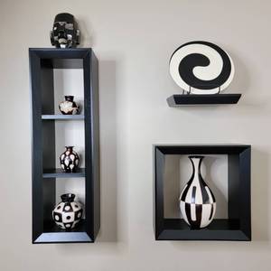 lot 18 image: Black and White Ceramic  Pieces with Black Wooden Shleves
