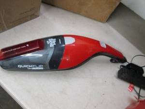 Mini Dirt Devil handheld vacuum, op...