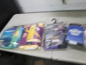 4 costumes open box ...