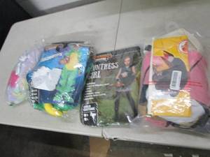 4 costumes open box ...