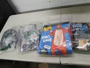 4 costumes open box ...
