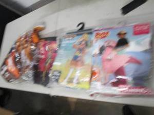 4 costumes open box ...
