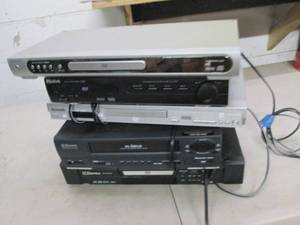 4 dvd players and 1 vhs player, pow...
