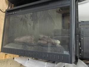 electric fireplace powers on ...