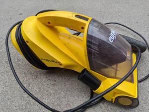 Vintage Sprinkler and Eureka Vacuum