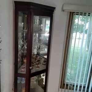Stunning Lighted Corner Curio Cabinet with Glass Shelving