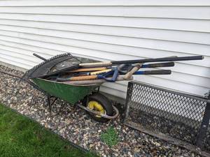 lot 115 image: Yard Tool Lot - Wheelbarrow, Rake, Axe, Pitchforks, and More