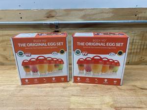 lot 45 image: EGGY YO Lot of 2-  Hard Boiled Egg Makers 5 in 1 Egg Cooker Set with 6 Silicone Cups, Holder, Brush, White Separator, Timer - Make Hard Boiled Eggs Without the Shell - As Seen on TV Egg Boiler