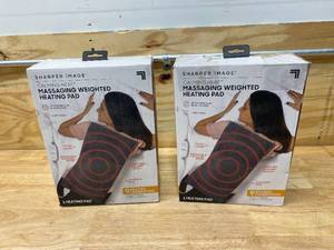 lot 40 image: SHARPER IMAGE Lot of 2-  Calming Heat Massaging Weighted Heating Pads (12x24- 4lbs)