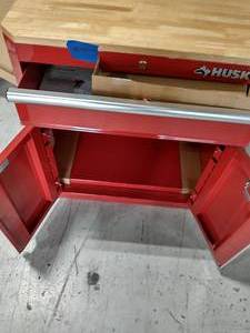 lot 68 image: HUSKY Ready-to-Assemble 23-Gauge Steel 1-Drawer 2-Door Garage Base Cabinet in Red (28 in. W x 33 in. H x 18 in. D)