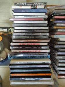 Collection of CDs & CD Cleaner