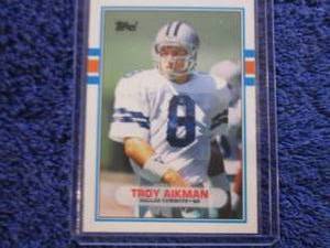 lot 78 image: 1989 Topps Troy Aikman Rookie Card...