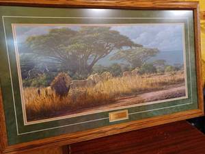 lot 10 image: Standoff - Cape Buffalo and Standoff - Lions by Artist Simon Combes, 1990
