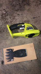 lot 18 image: RYOBI ONE 18V Cordless Battery Grass Shear Trimmer with 1.5 Ah Battery and Charger