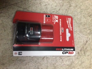 lot 32 image: Milwaukee M12 12-Volt Lithium-Ion 2.0 Ah Compact Battery Pack