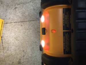 lot 45 image: DEWALT 1600 Peak Amp Portable Car Jump Starter with 120 PSI Digital Air Compressor and 500-Watt Inverter