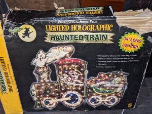 lot 11 image: Lighted Holographic Haunted Train