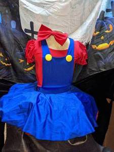 lot 16 image: Girls Minnie Mouse Costume