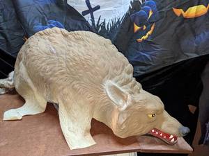 lot 6 image: Lifelike Crouching Wolf