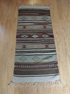 lot 17 image: Handwoven Rug