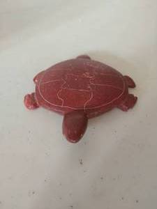 lot 157 image: Pipestone turtle
