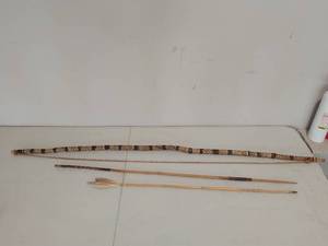 lot 147 image: Tribal Bow and Arrow