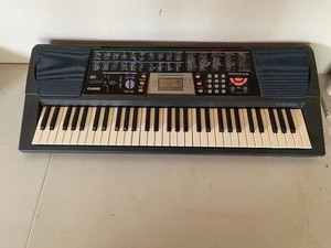 lot 234 image: Casio Electric Keyboard