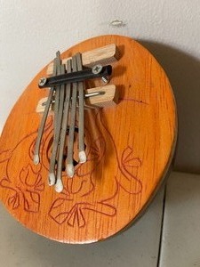 lot 199 image: Coconut Kalimba Instrument
