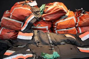 LOT OF 11 ANTI-EXPOSURE GUMBY SUITS