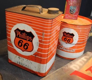 MISC ADVERTISING & OIL CANS, TWO GALLON PHILLIPS 66 IS FULL