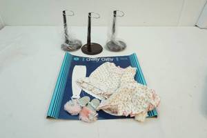 Doll clothes and stand